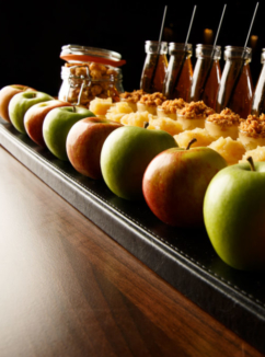 Cakes, apples and bottles of apple juice